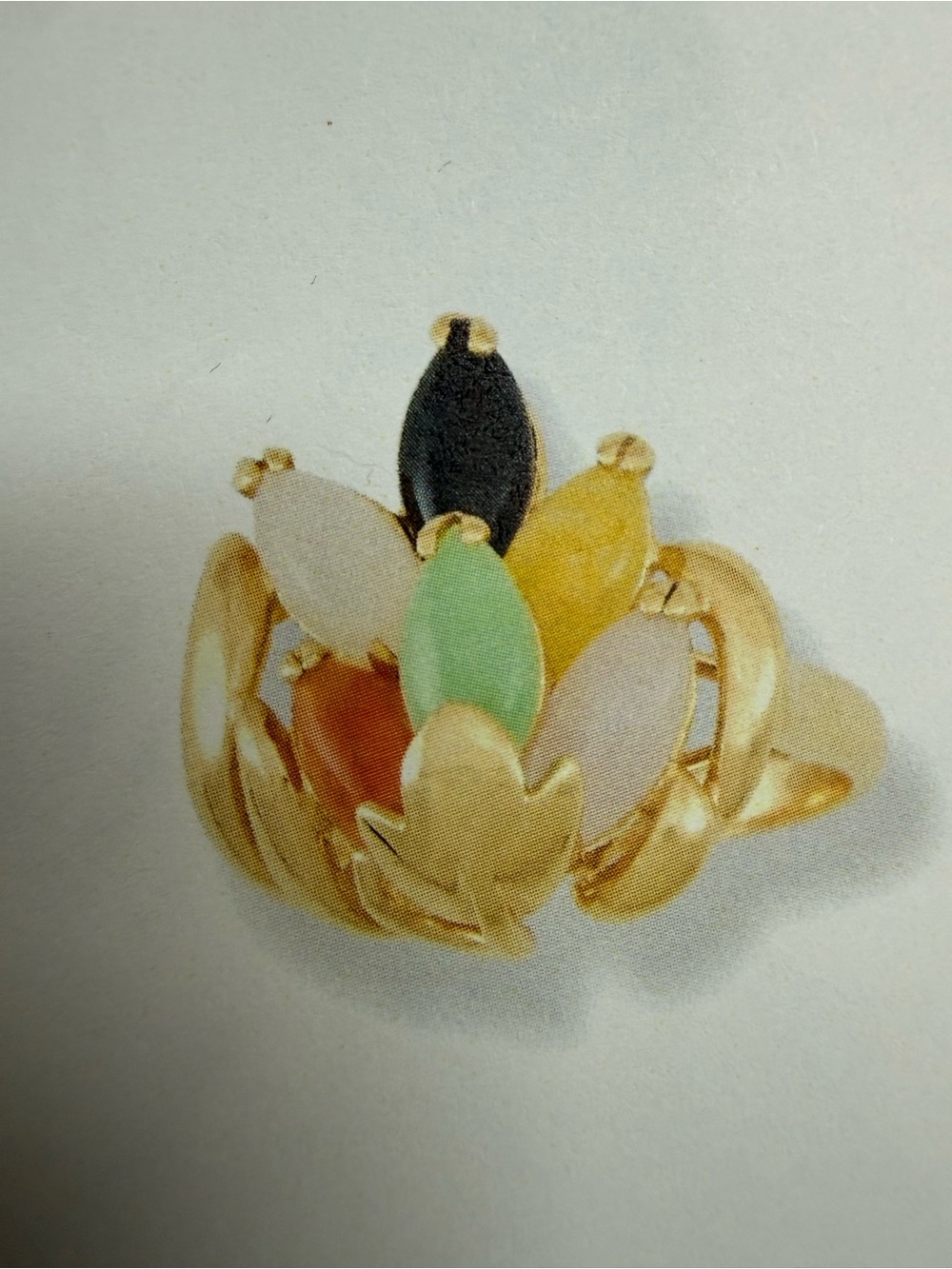 Marquise Jadeite Jade six stone ring set in a 14 karat yellow gold. Size 6.5.